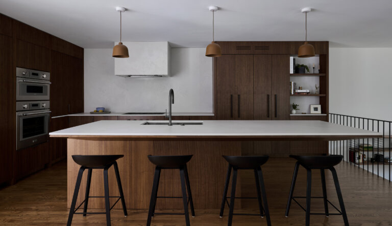 Modern kitchen in walnut with cantilever island countertop